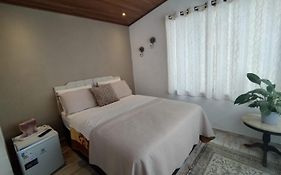 Ótima suíte próxima ao centro